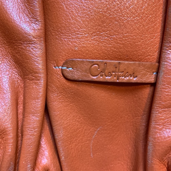 Cole Hahn orange handbag with fringe and silver hardware. - Picture 15 of 16